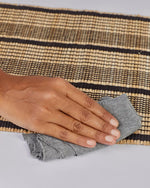 Load image into Gallery viewer, Sana – Banana Fiber Table Runner with Black Cotton Stripes
