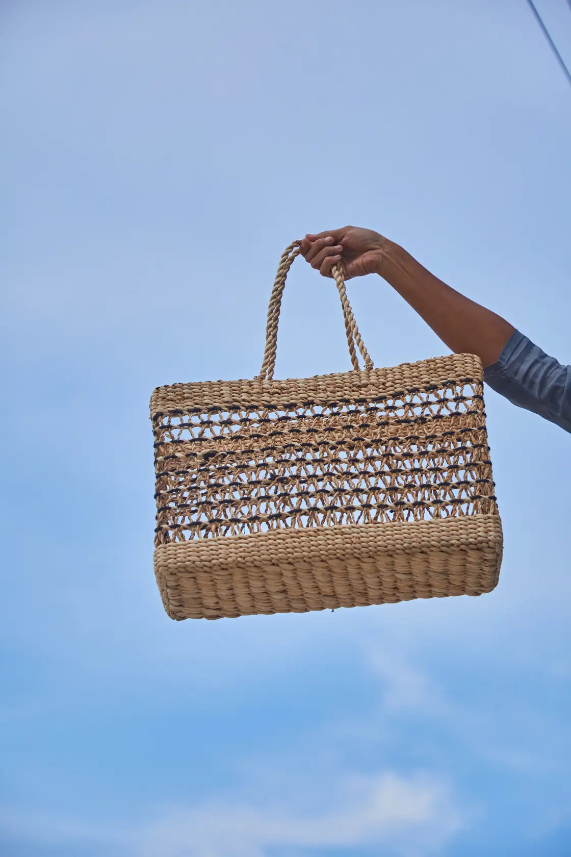 Risha   banana fiber beach tote bag with weave detail